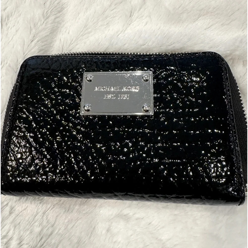 Michael Kors Snakeskin Wristlet in amazing condition!‎